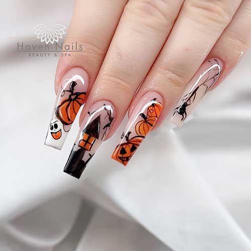 Long coffin Halloween nails cute feature pumpkins, ghosts, and a spiderweb over a nude base color.
