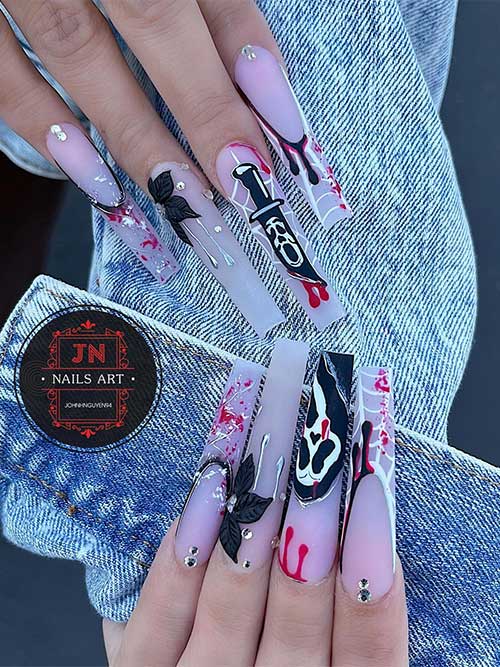 Long scream Halloween nails coffin shaped with white cobwebs, black scary ghost faces, and blood splatter nail art.