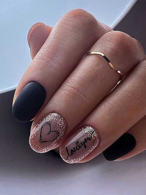 Classy and romantic short matte black and gold glitter nail design with a black heart shape and “love you” words