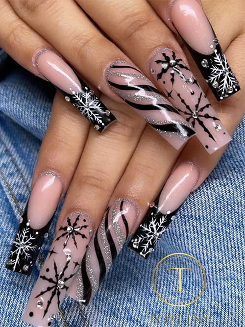 Long square-shaped French black Christmas nails adorned with crystals and black and silver glitter candy cane nail art accent
