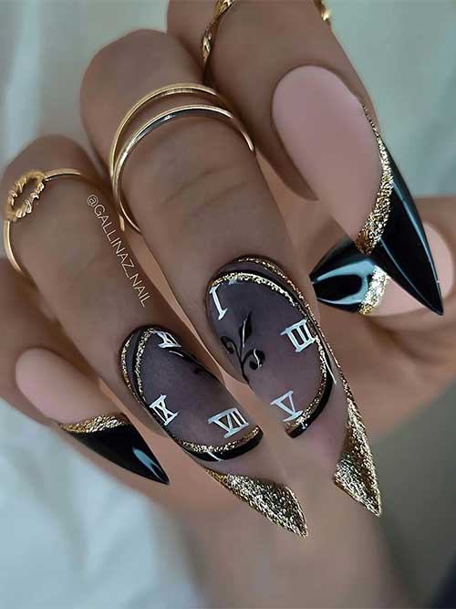 Long stiletto-shaped black and gold glitter New Year’s nails with clock nail art on the finger and middle accent nails