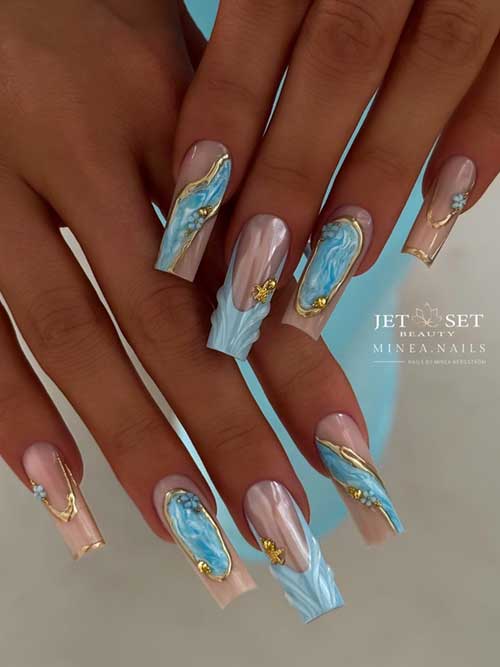 Light blue square nails with gold accents, starfish, and pearl embellishments create a serene, ocean-inspired look Light blue square nails with gold accents, starfish, and pearl embellishments create a serene, ocean-inspired look