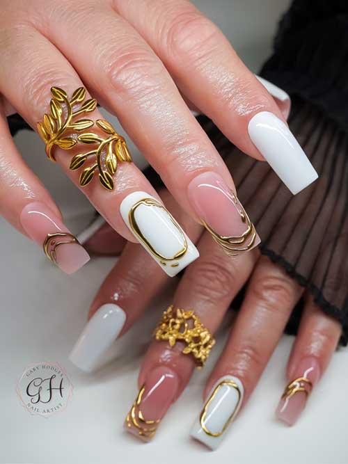 Elegant white and gold nail design featuring crisp white with luxurious gold accents for a chic, sophisticated look. Elegant white and gold nail design featuring crisp white with luxurious gold accents for a chic, sophisticated look.