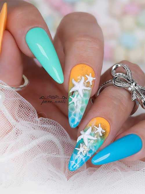 Ocean-themed nails feature a sunset gradient of yellow and turquoise, with 3D starfish and gold accents for a beachy vibe. Ocean-themed nails feature a sunset gradient of yellow and turquoise, with 3D starfish and gold accents for a beachy vibe.